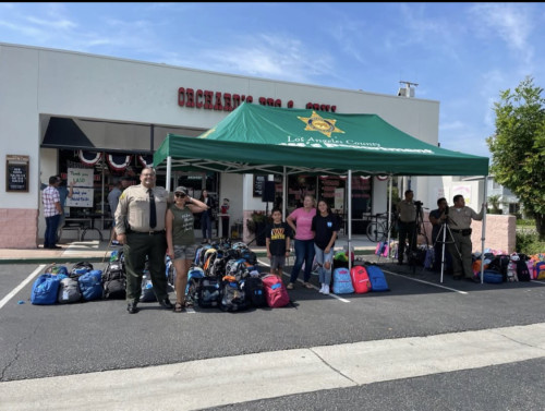 Orchids BBQ Grill (Whittier) owners and staff assembled backpacks for LA County Sheriff’s Stations