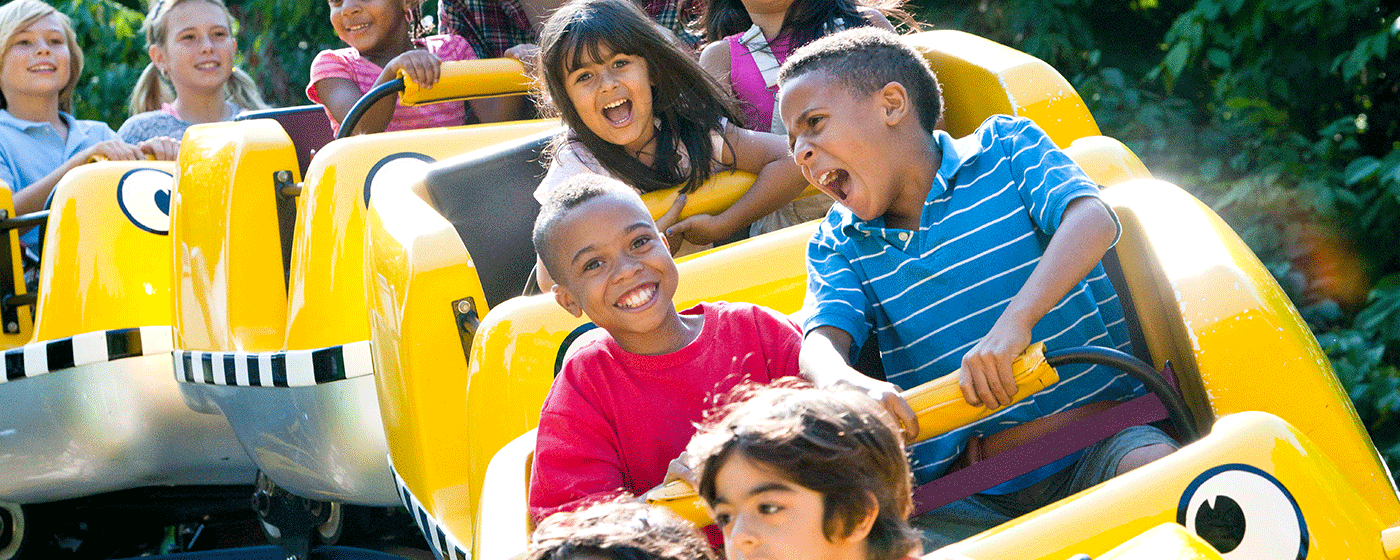 Children smiling on ride